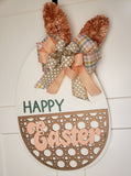 Welcome your guests for the Easter holiday with our delightful Easter Door Decor. A Diy kit featuring an adorable Egg-shaped Door Hanger adorned with trendy wicker details and 3-D lettering